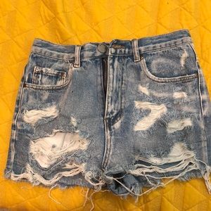 Distressed denim shorts